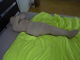 Blue haired Teen girl put in mummification