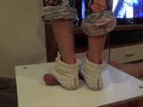 Girl in sneakers trample on cock and balls. Ends bootjob and cumshot