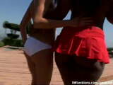 Open-air interracial lesbian sex under the hot sun