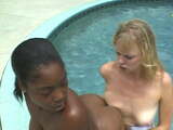 Interracial lesbian action in the pool