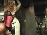 Two hot tattooed dominatrixes torture their slave