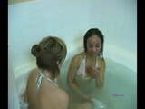 Two horny girls take a bath and give each other orgasams