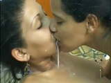 Ebony lesbians lactating &amp; spit swap