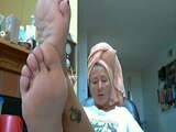 Mature shows feet