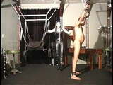 mistress in leather punishing slave