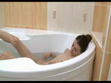 Skinny girl in the bath