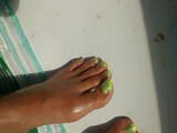 Oiling my feet tanning