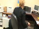 tall mature lady in office with  her foot slave  