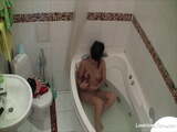 Bathtub masturbation of the breathtaking Asian girl 