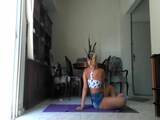 Pretty latin girl doing yoga