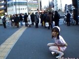 Naughty Asian girl is pissing in public