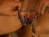 Heavily Pierced MILF is Fisted